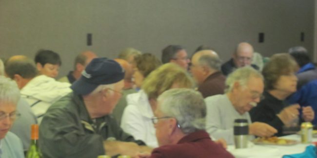 group of people sitting at a table
